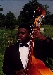 [Image: Of The Bass-Man with his
string Bass]